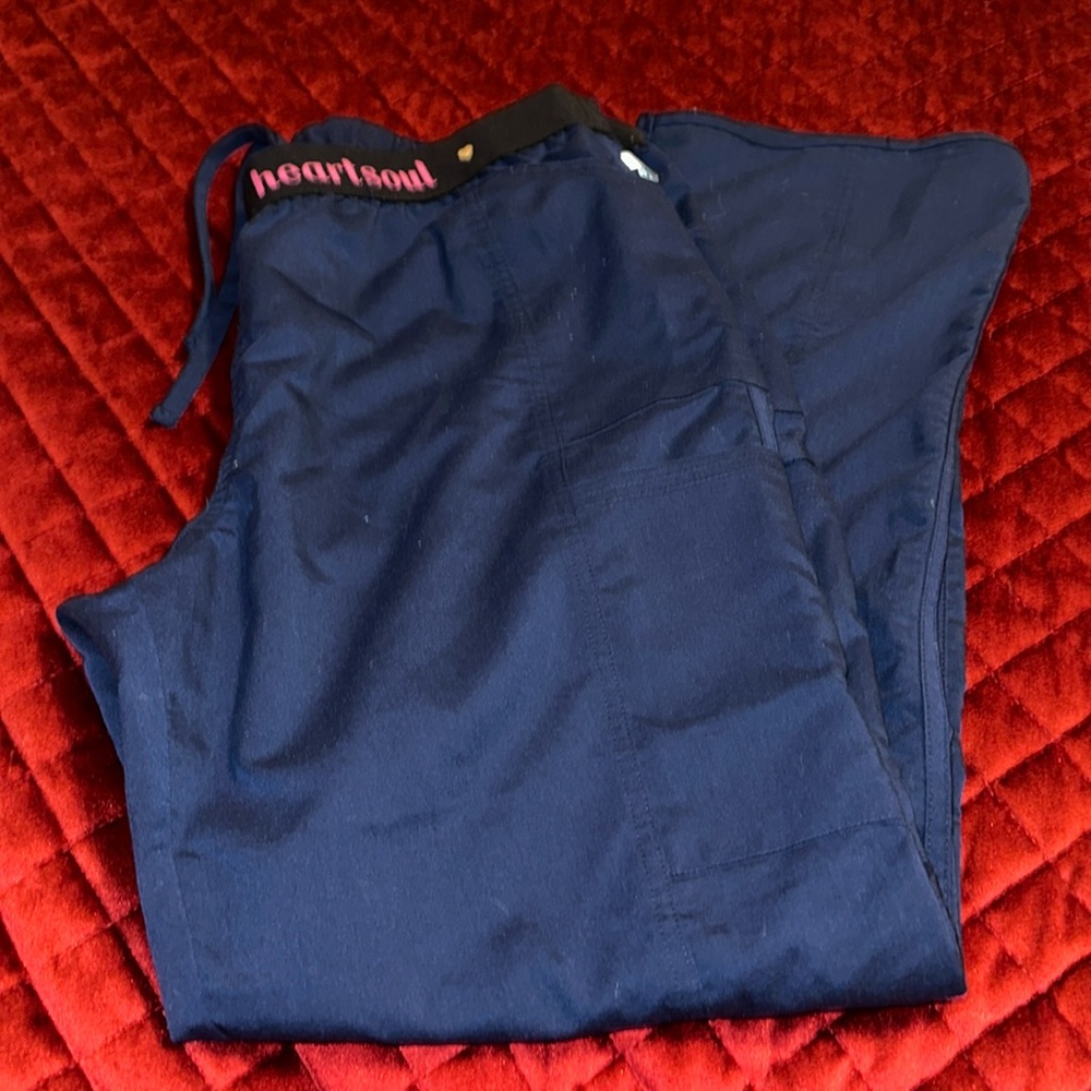 Navy blue scrub bottoms. Some pilling throughout.